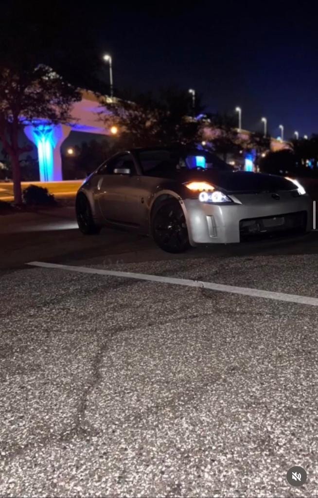 O.R. Performance 350Z at night with blue accent lighting in parking lot