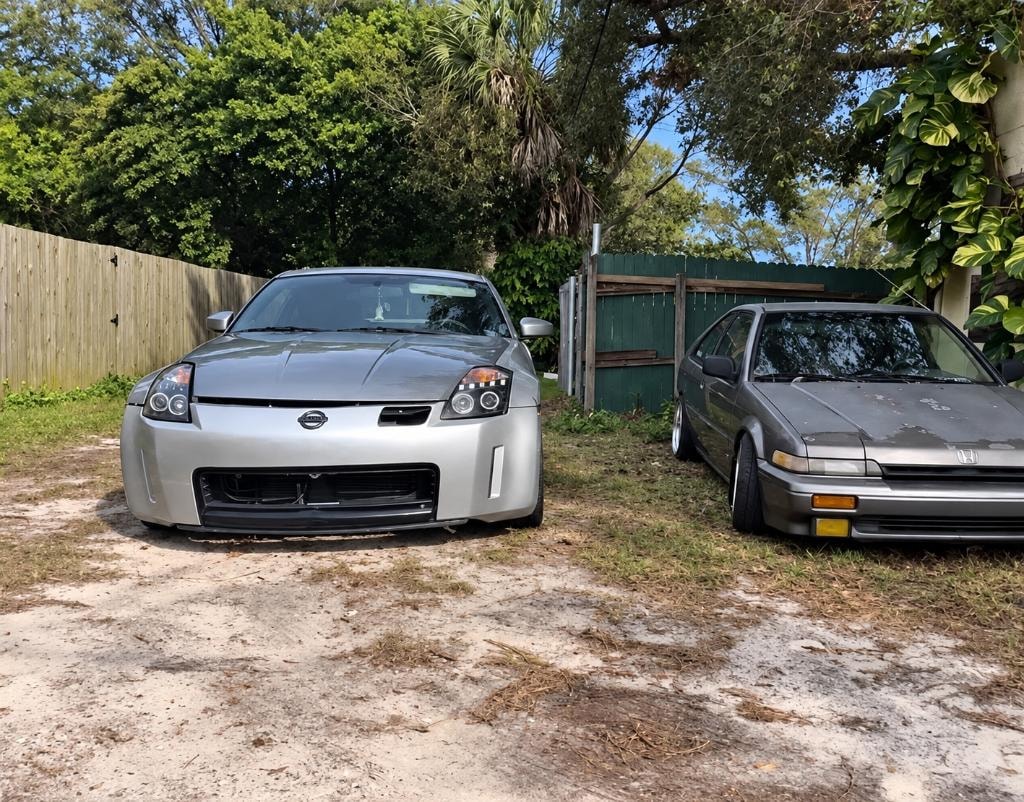 2004 350Z and Honda Accord parked side by side in a residential driveway